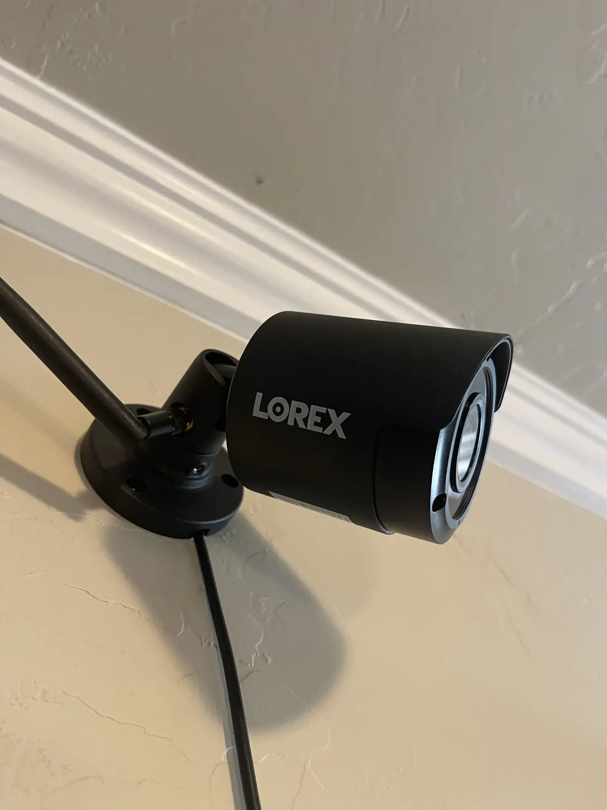 Lorex bullet camera on a wall mount